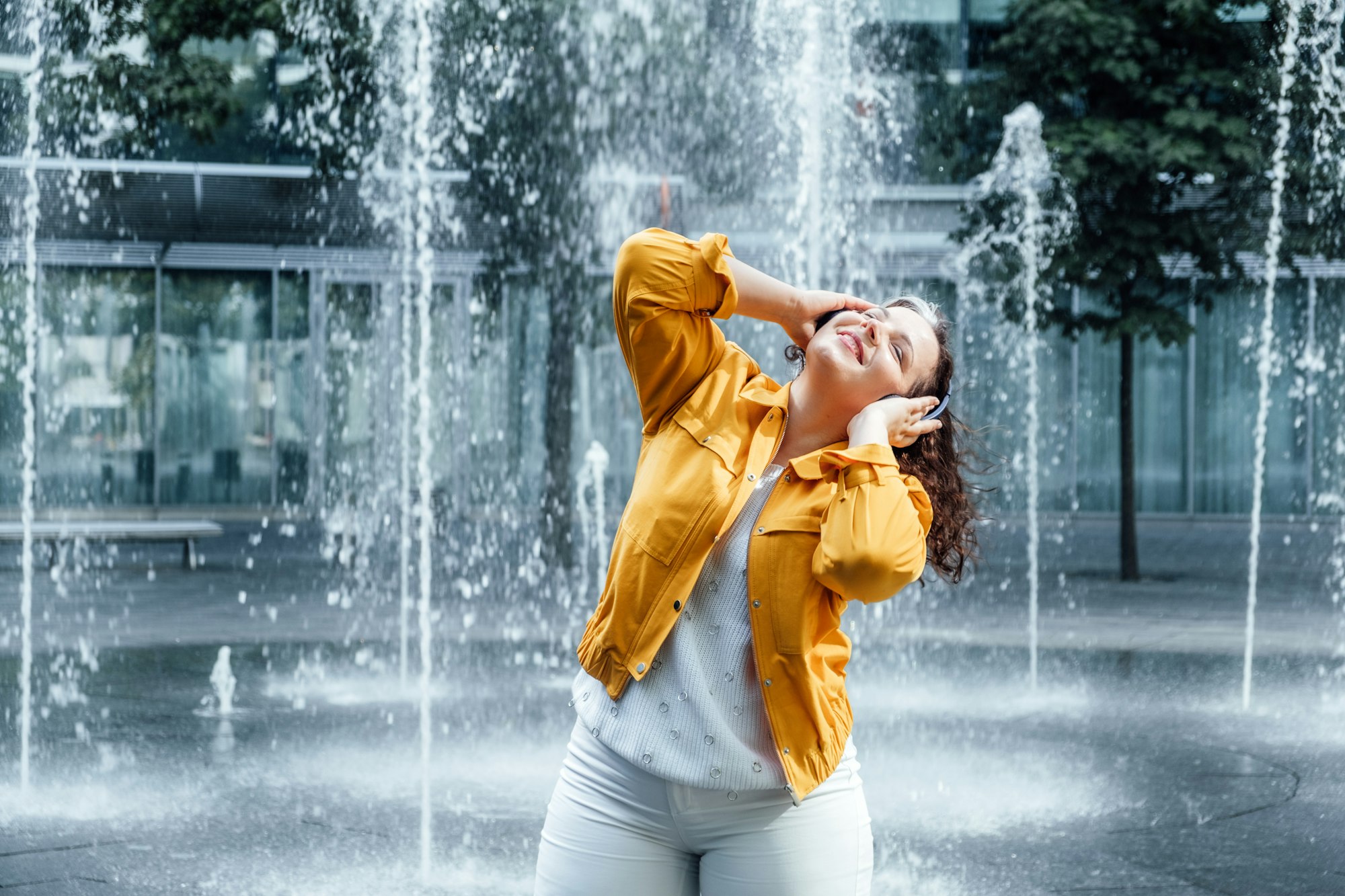 Outdoor portrait of Woman in headset in sound healing therapy. Healing Sounds and Sound Therapy