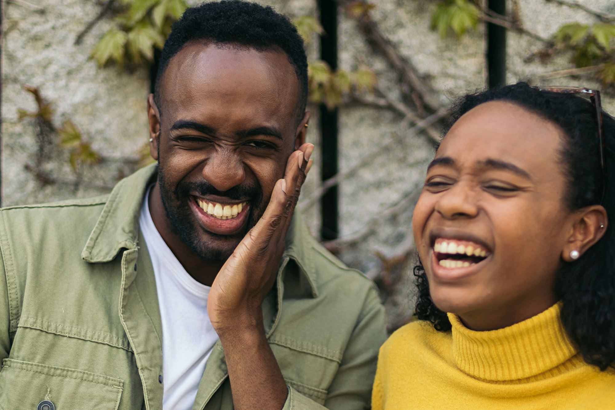 two black people portrait laughing. close-up